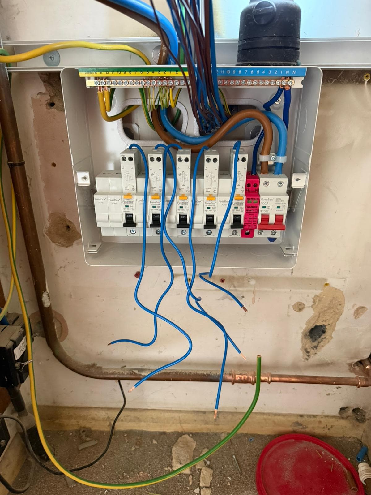 New board being wired in, with circuits run back ready for termination