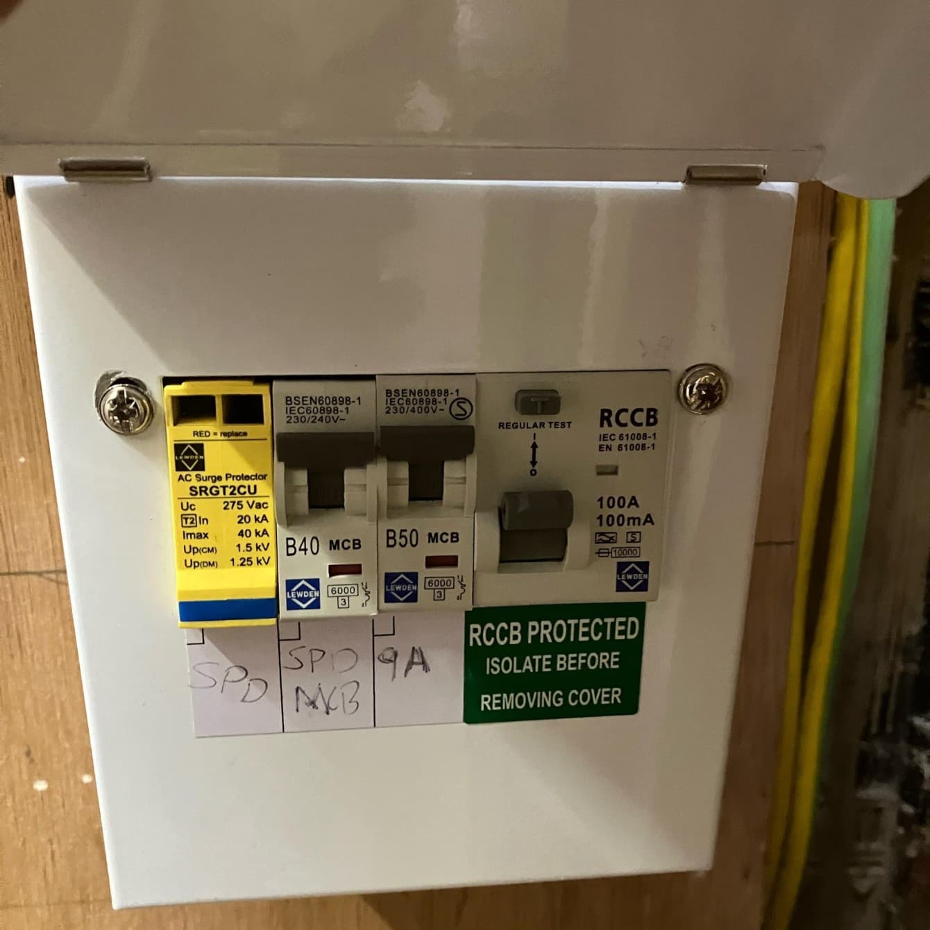 New consumer unit with surge protection and an RCCB, neatly wired and labelled